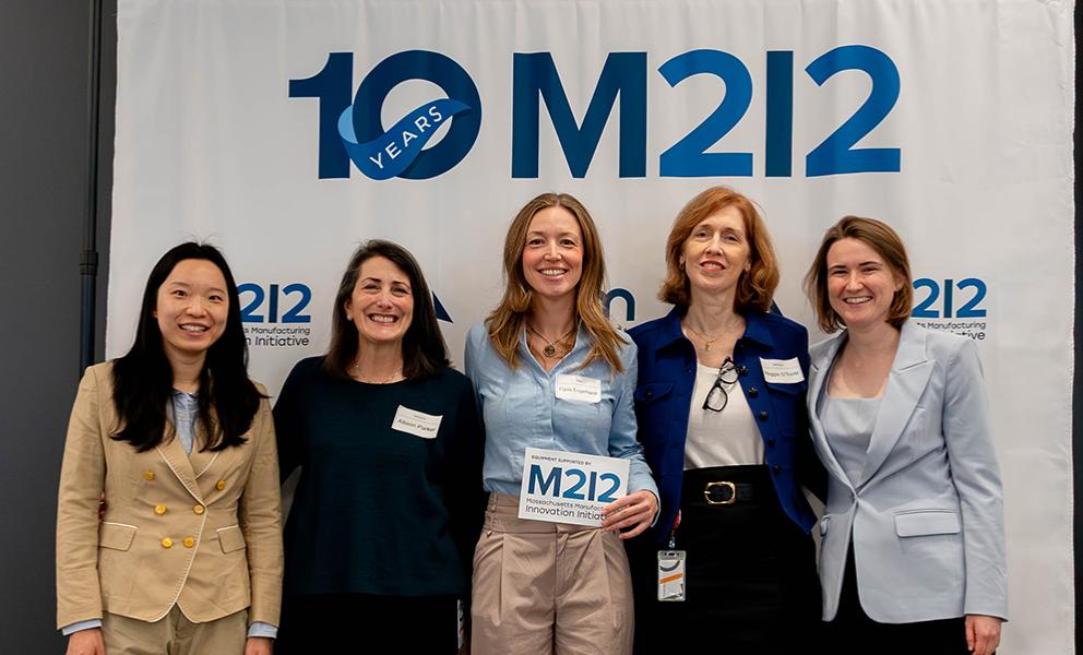 CAM Team with group of awardees at 10 year M2I2 celebration