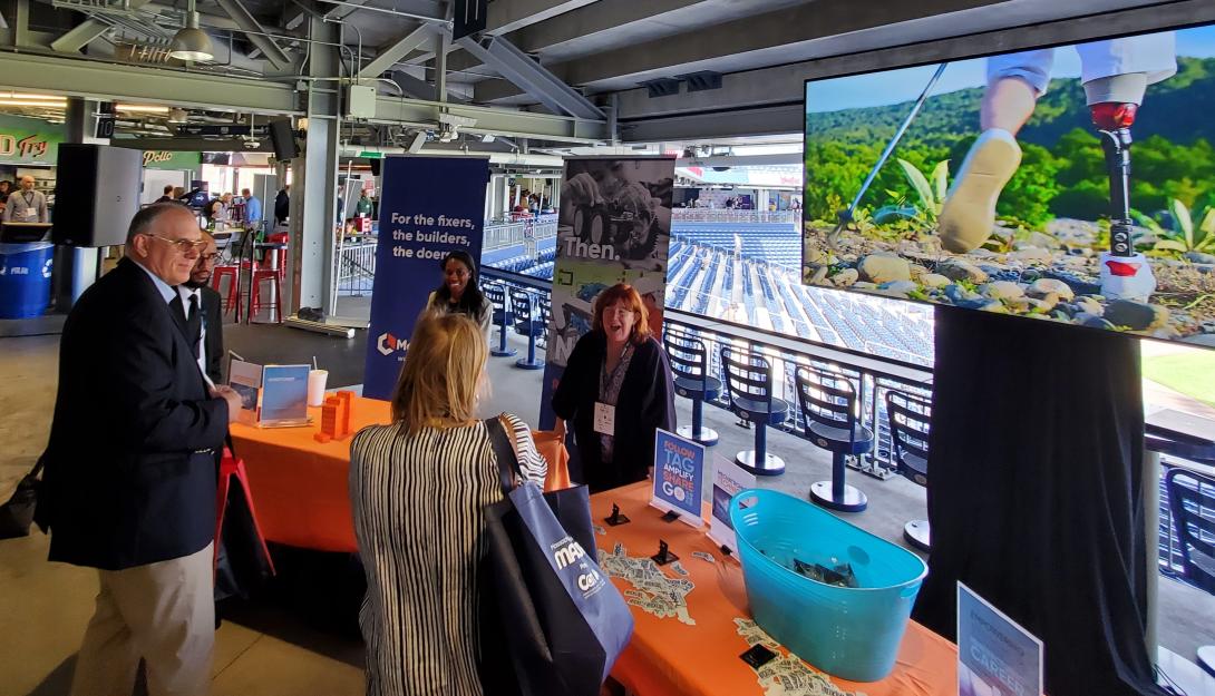 MassMakes exhibit table at the Mash-Up event